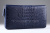 Клатч из кожи крокодила